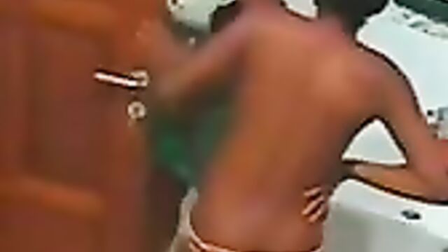 Эротичная негритянка в трусиках поглаживает соски