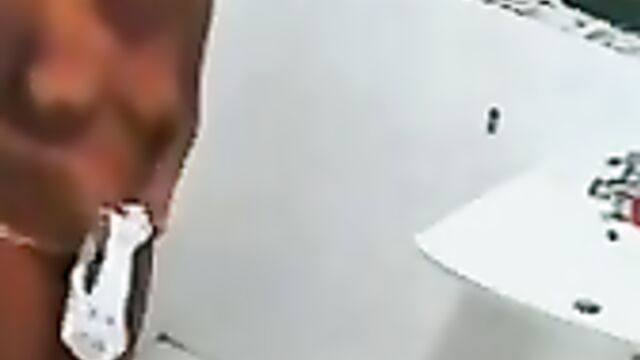 Эротичная негритянка в трусиках поглаживает соски